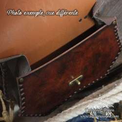 Handmade carved belt bag with a fleur-de-lys design