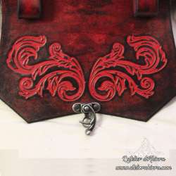 Handmade carved belt bag with an arabesque design