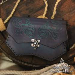 Handmade carved belt bag with an arabesque design