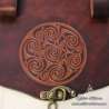 Handmade carved belt bag with a celtic design