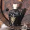 Small glass bottle with an Elven pendant carved leather belt holder