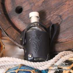 Small glass bottle with an Elven pendant carved leather belt holder