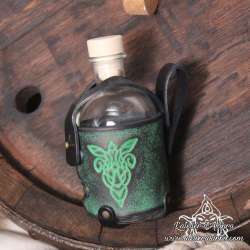 Small glass bottle with an Elven pendant carved leather belt holder