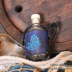 Small glass bottle with a kraken sinking a ship leather belt holder