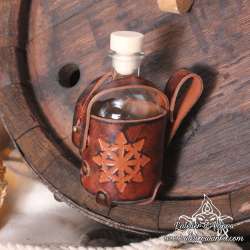 Small glass bottle with a Star of Chaos carved leather belt holder