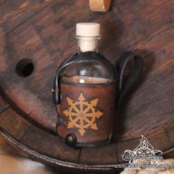 Small glass bottle with a Star of Chaos carved leather belt holder