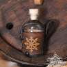 Small glass bottle with a Star of Chaos carved leather belt holder