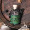 Small glass bottle with the One ring carved leather belt holder