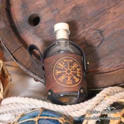 Small glass bottle with a Vegvisir carved leather belt holder