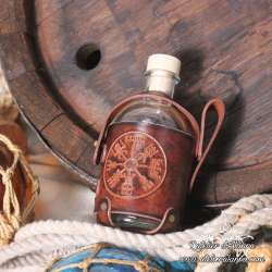 Small glass bottle with a Vegvisir carved leather belt holder