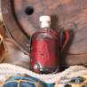 Small glass bottle with a  dwarf Long Beard carved leather belt holder