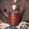 Big glass bottle with a Dwarf coat of arms carved leather belt holder